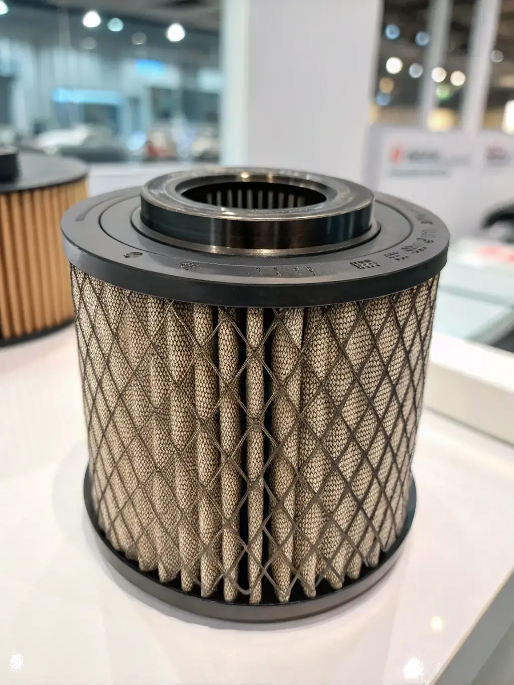 A selection of high-quality automotive filters (oil, air, cabin) displayed neatly, highlighting their importance for vehicle maintenance.